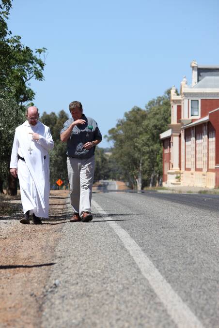Striking accord: New Norcia Monestary abbott John Herbert discusses easing the roading situation in New Norcia with local MP Shane Love.