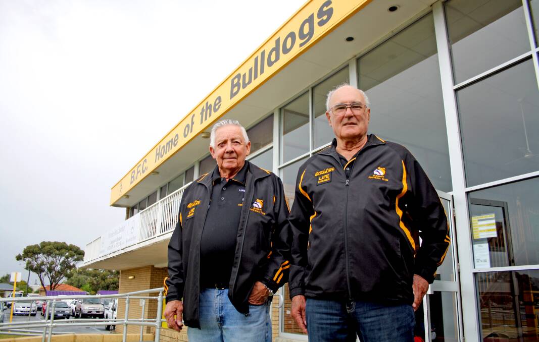 Long-time Bunbury Football Club volunteers and life members Eric Sargent and Bob Dow ahead of the 2015 South West Football League volunteer recognition round. Photo: Andrew Elstermann. 