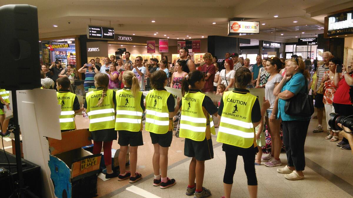 Mandurah Primary Students give a road safety performance at Mandurah Forum shopping centre.