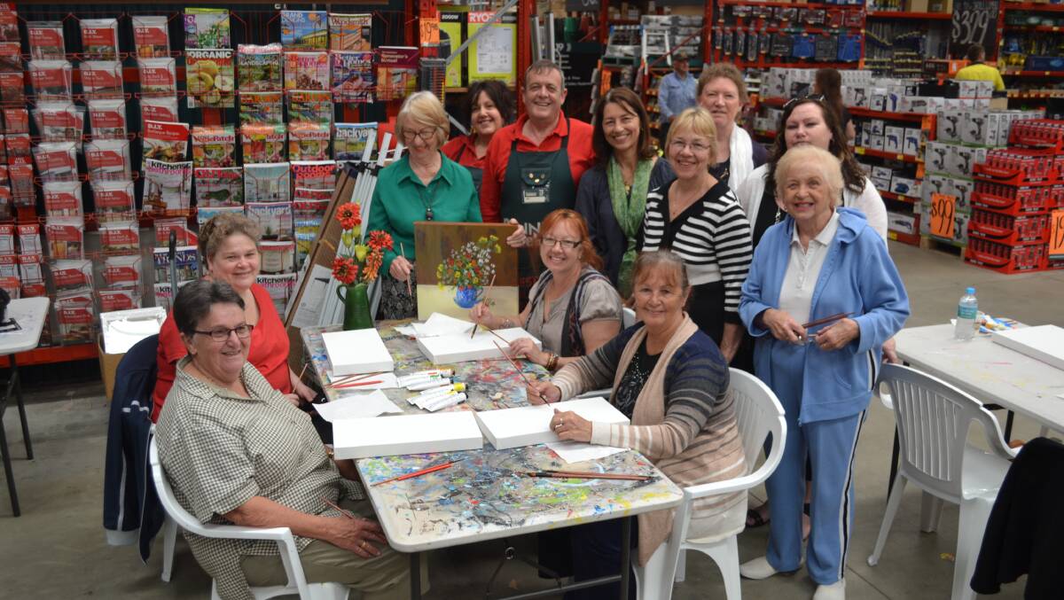 Grandcarers, Wanslea Grandcare and Bunnings staff test out their artistic skills. 