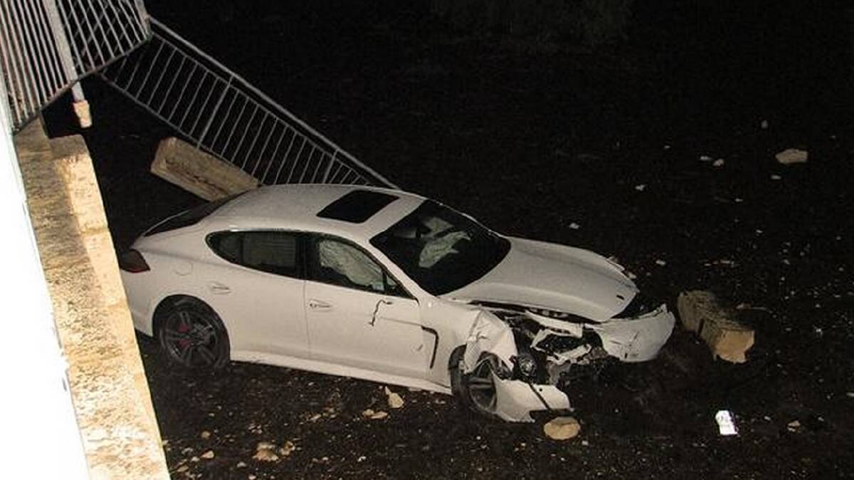 Lucky escape after Porsche drops metres off a ledge in Perth