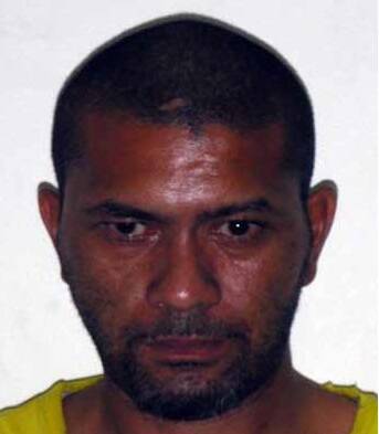 Steven Pasene is described as about 180cms tall with an olive complexion, of solid build withshort black hair. 