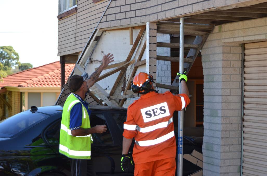 The car was removed from the Halls Head house on Monday morning. (Photo: Brianna Johnson)