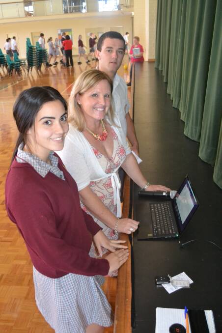 Learning about safety online: Mandurah Catholic College students Georgia Commisso and Jack Tomerini with cyber bullying expert Susan McLean.