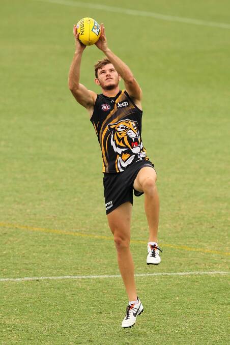 FORMER Pinjarra Tiger Kamdyn McIntosh has signed a new one year contract with the Richmond Tigers for the 2015 season.