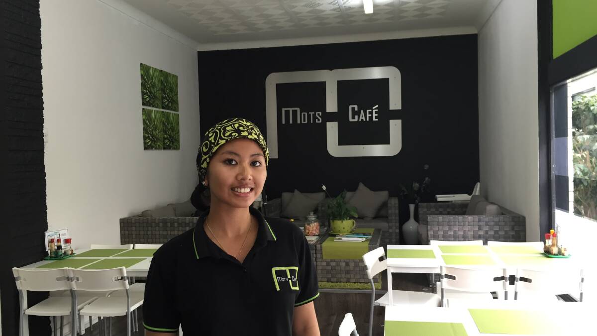 Mots Cafe owner Muhaini Taylor has vowed to keep smiling despite a stream of vicious online racism directed at her business earlier this week. 