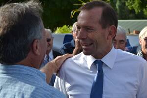 Tony Abbott mingled with locals this morning while opening the new Liberal Brand House.