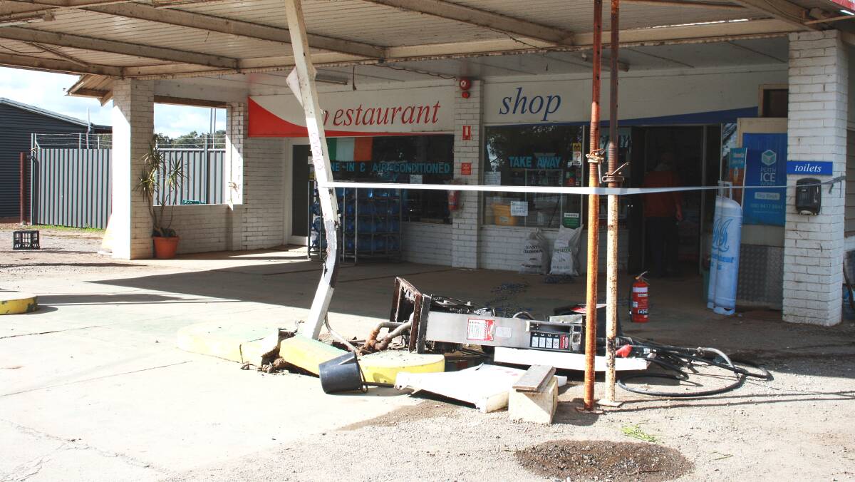A dual-wheel tyre from a semi-trailer came off and smashed into a Pinjarra roadhouse.