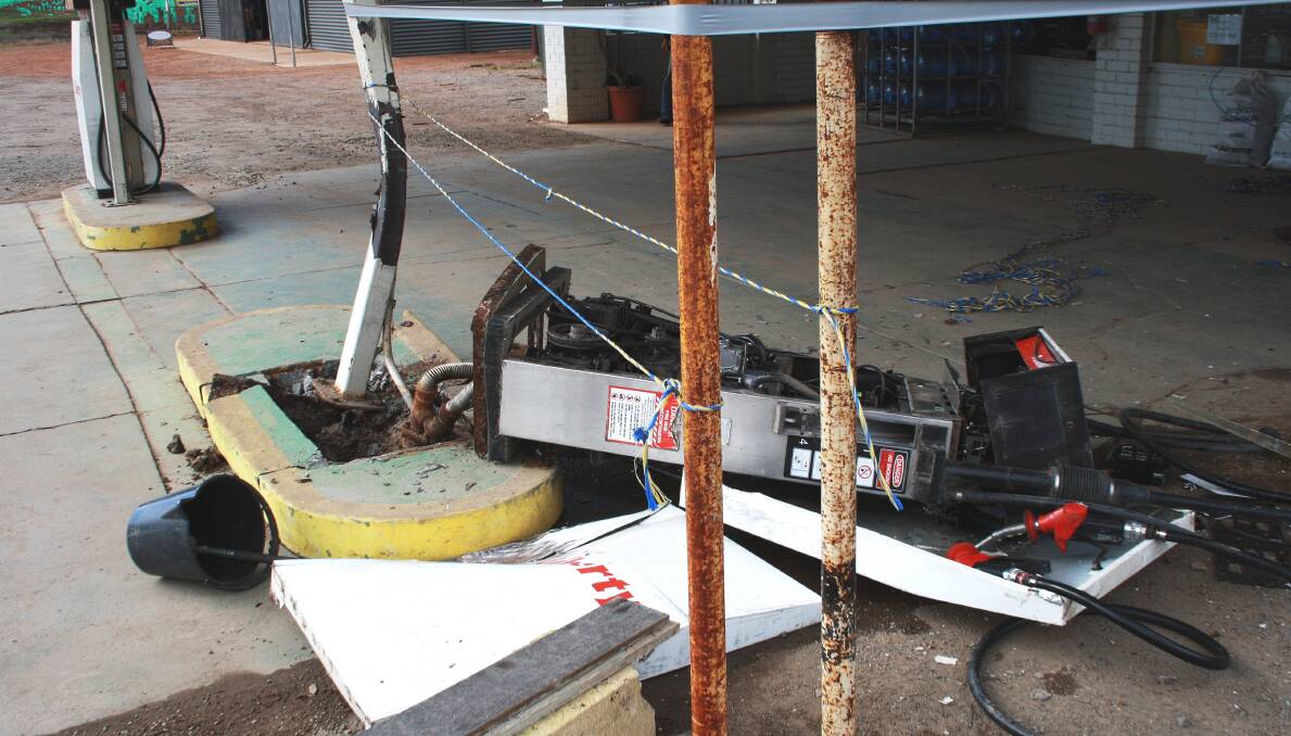 A dual-wheel tyre from a semi-trailer came off and smashed into a Pinjarra roadhouse.
