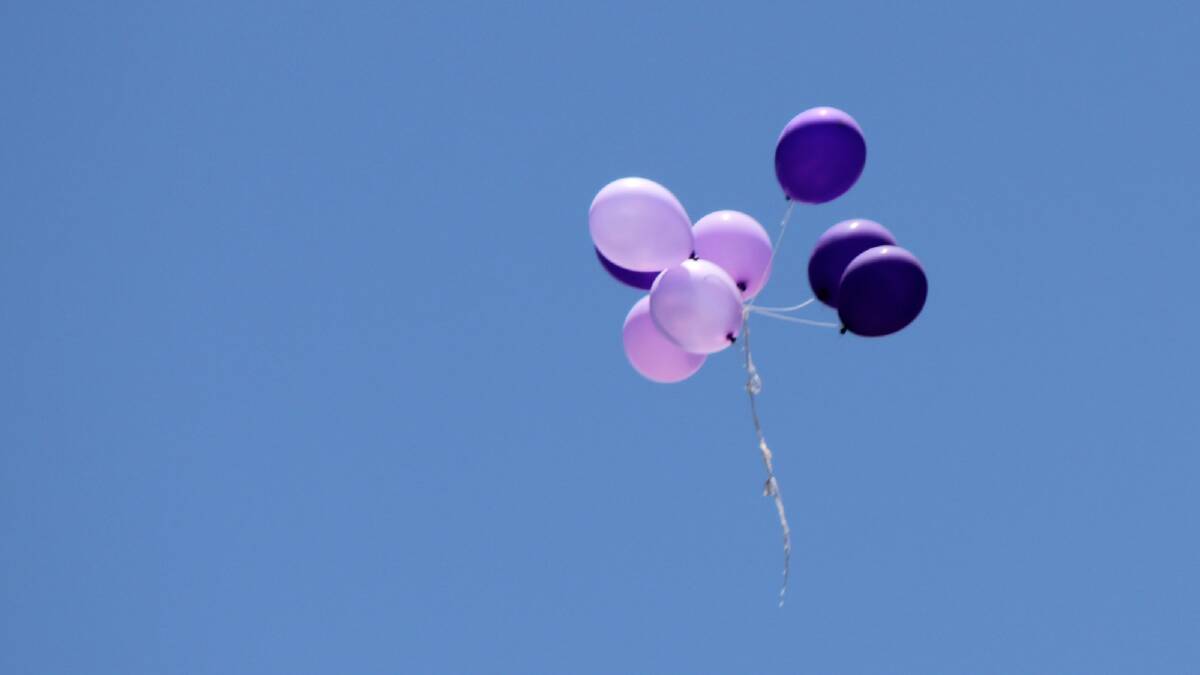 Balloons were released at Jessie's memorial. Her favourite colour was purple.