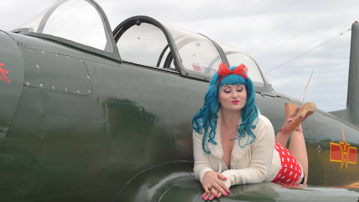 A PHOTO shoot at Murrayfield Airport on the weekend saw temperatures run high as pin-up girls strutted their stuff aboard Warplanes WA aircraft.