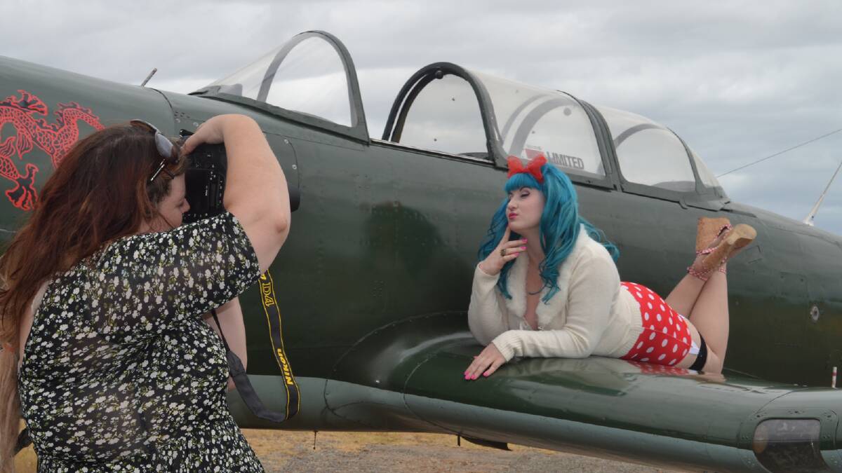 A PHOTO shoot at Murrayfield Airport on the weekend saw temperatures run high as pin-up girls strutted their stuff aboard Warplanes WA aircraft.