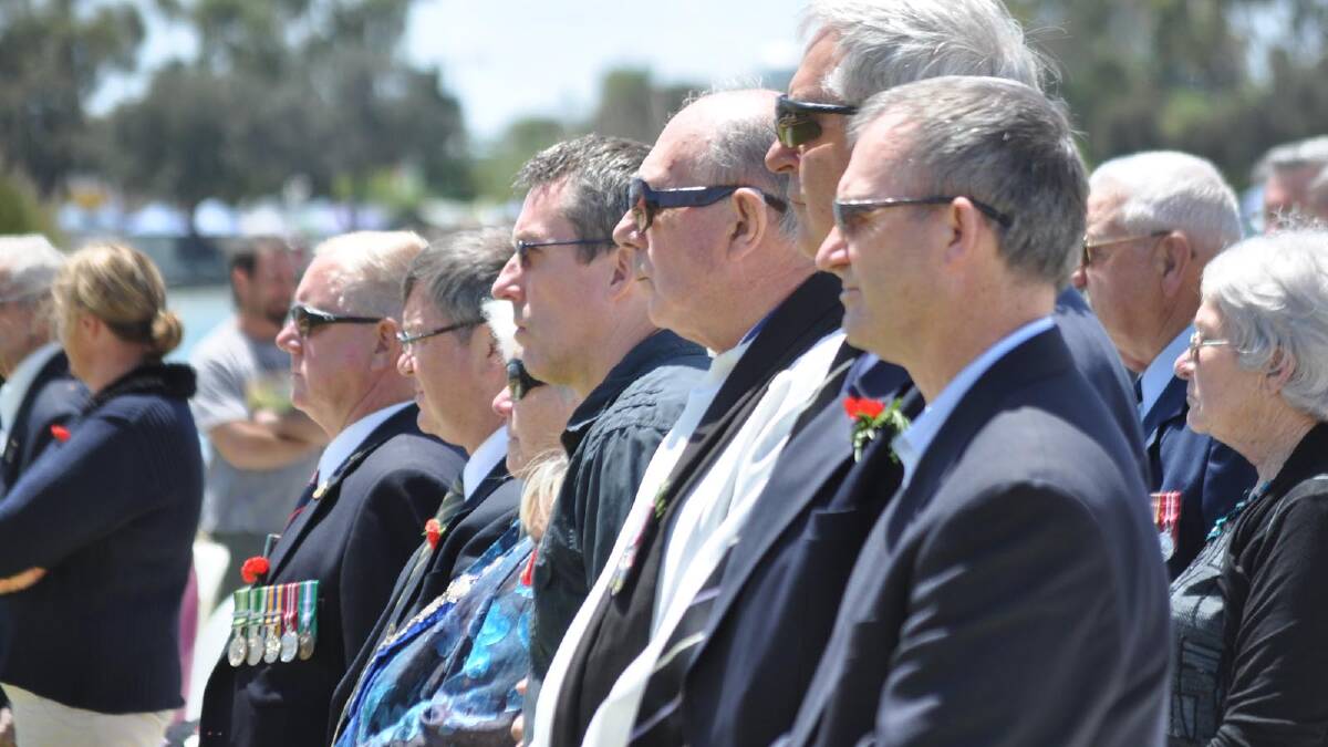 HUNDREDS of people gathered at the war memorial today to remember fallen soldiers.