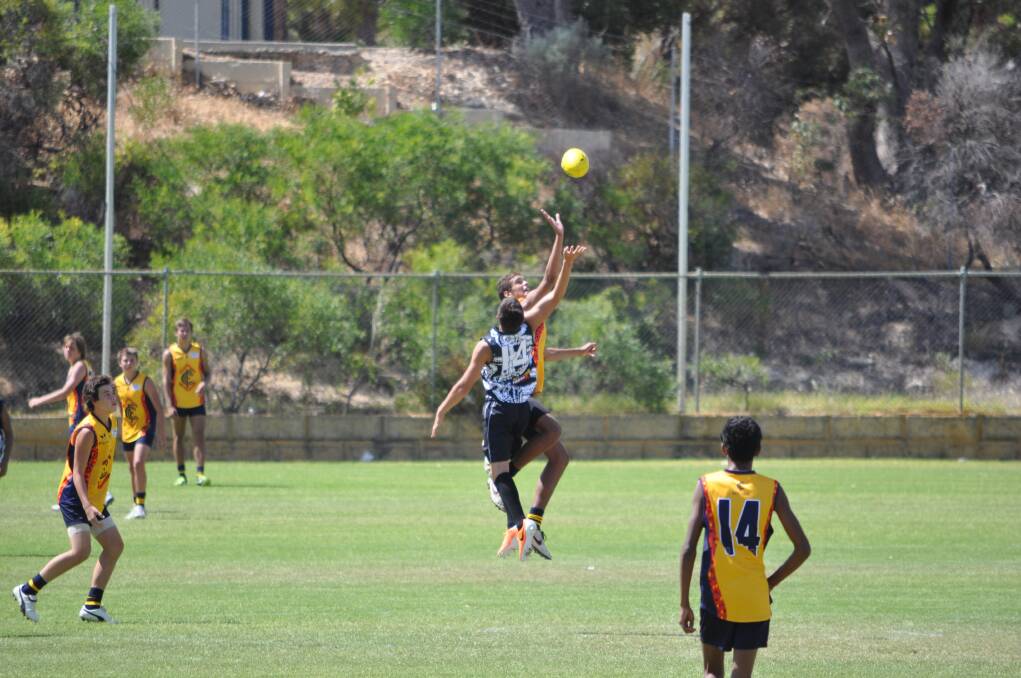 INDIGENOUS football players from all over the state descended on Mandurah on Sunday for the Nicky Winmar Cup which shines the spolight on up-and-coming AFL talent.