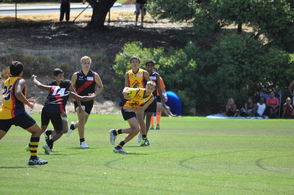 INDIGENOUS football players from all over the state descended on Mandurah on Sunday for the Nicky Winmar Cup which shines the spolight on up-and-coming AFL talent.