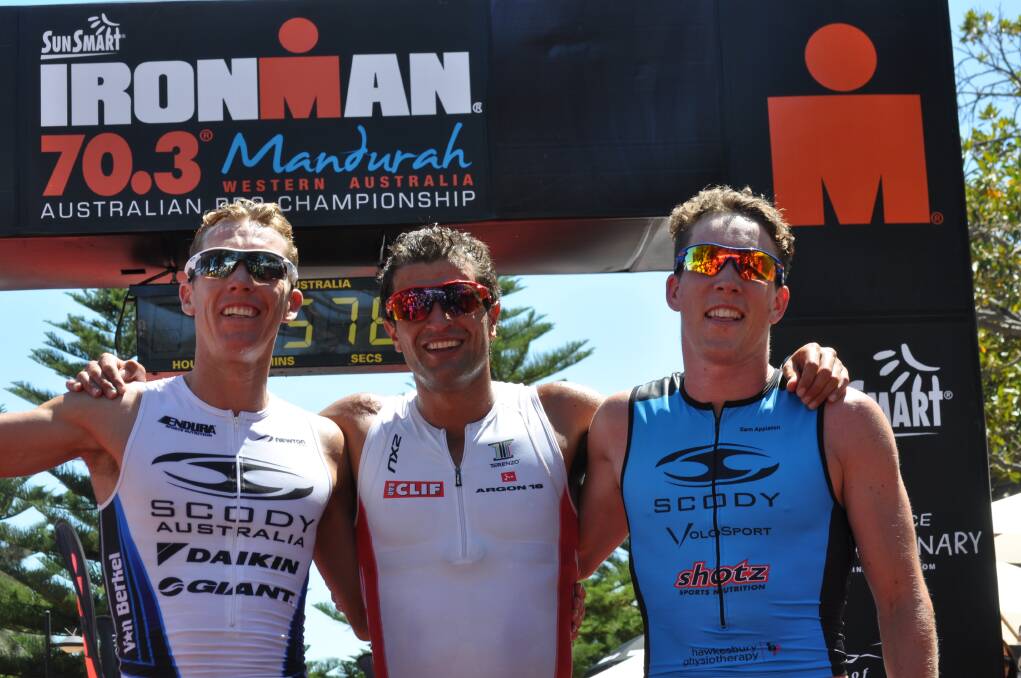 A MASSIVE crowd took to local waterways and streets today for the Sunsmart Mandurah Ironman 70.3.