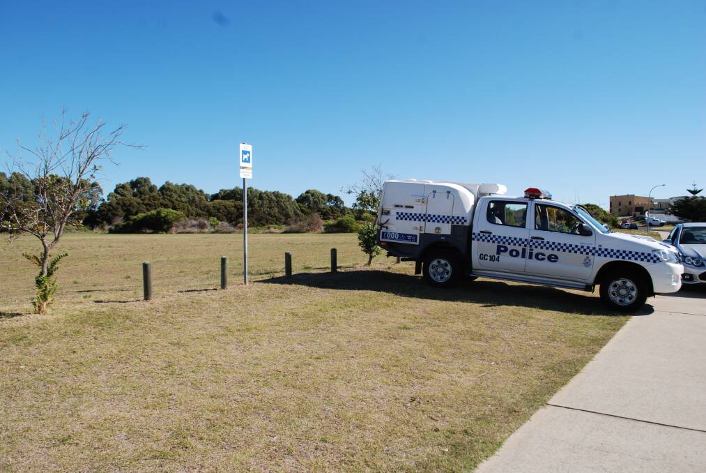 A police vehicle near the scene at the home cordoned off in Calypso Road. Mandurah and Rockingham SES undertook a forensic search in nearby scrub.