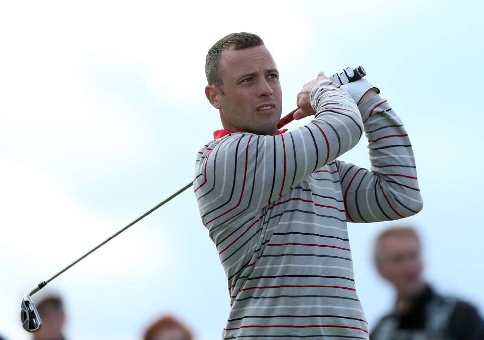 Oscar Pistorius plays off the 16th tee during the first round of The Alfred Dunhill Links Championship at Carnoustie Golf Links on October 4, 2012 in Carnoustie, Scotland. Photo by Warren Little/Getty Images