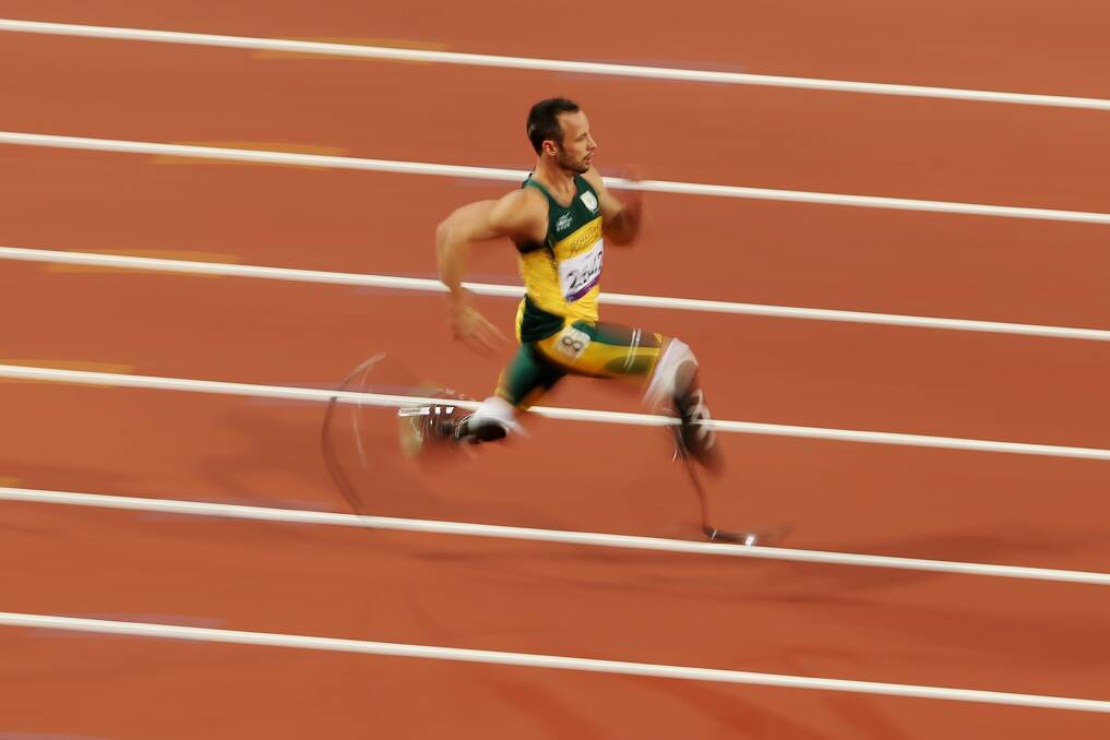 Oscar Pistorius broke the world record with a time of 21.30 when he competed in the Men's 200m - T44 heats on day 3 of the London 2012 Paralympics. Photo by Scott Heavey/Getty Images