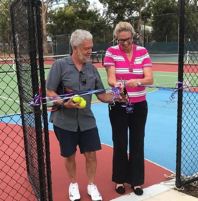 ACCESSIBLE: Dawesville MP Lisa Munday and South Mandurah Tennis Club president Allan Palmer officially opened two new, wheelchair accessible tennis courts. Photo: Supplied.
