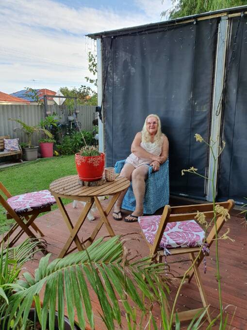 FREEDOM: Cathy has built a big deck and patio where she can enjoy time outside, soaking up the sun. Photo: Supplied.