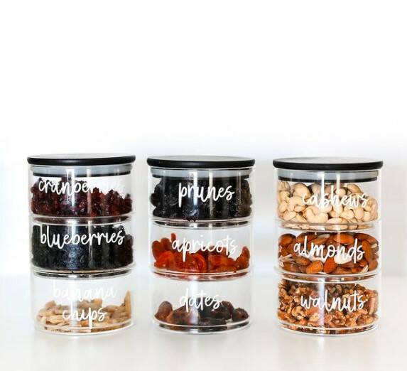 STORAGE: Deanna's business makes labels and containers perfect for getting the house in order. Photo: Pretty Little Designs Instagram.