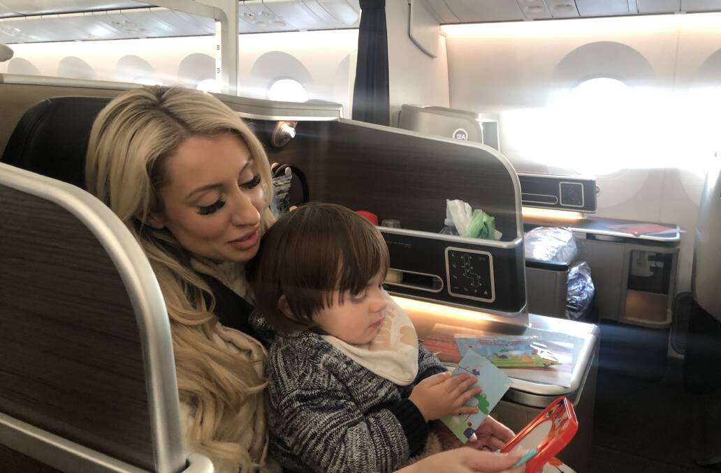 Monique and Theodore on the plane to pageant land. Picture supplied.