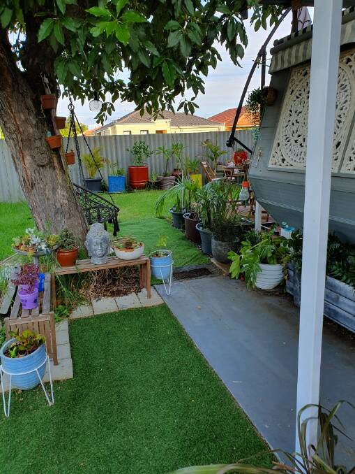 RENOVATOR: Cathy has designed her garden and van just the way she likes it, making it a home she loves to come home to. Photo: Supplied.