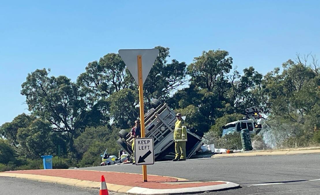 TRAFFIC WARNING: A truck carrying 4000 litres of paint has rolled over on Old Coast Road. Photo: Supplied.