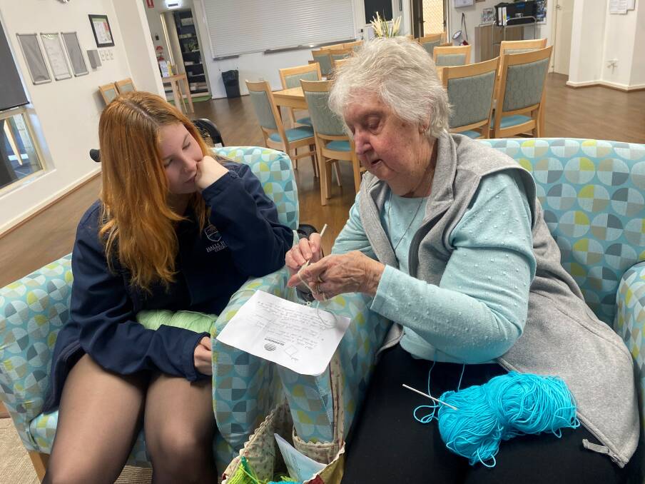 Students from Halls Head College met with local seniors to learn the art of crochet. Picture supplied.