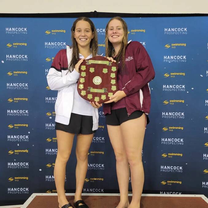 DEFENDED TITLE: Peel Aquatic Club's senior swimmers Summer Houston and Caitlin Leather with their regional shield at the Senior State Finals. Photo: Peel Aquatic Club.