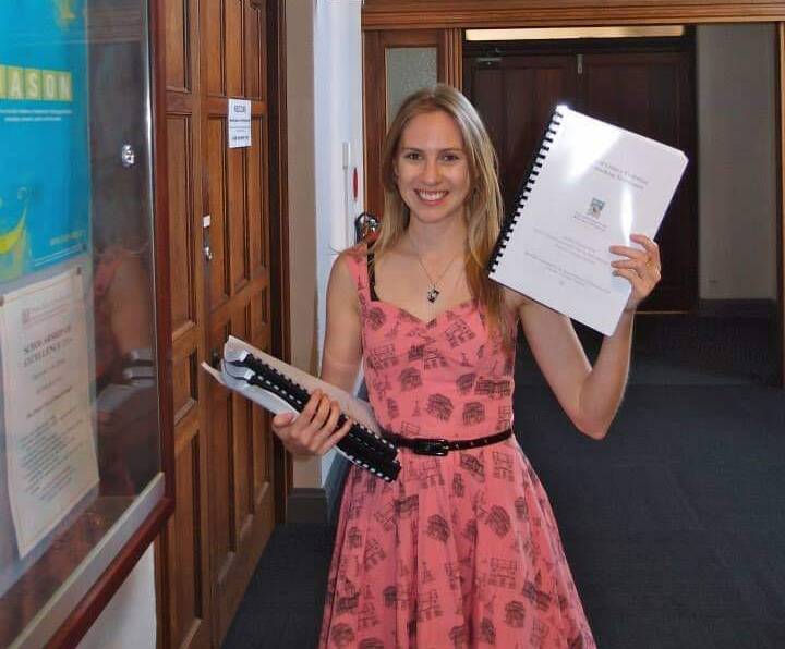 ACHIEVEMENTS: Jacinta submitting her PhD thesis at UWA. Picture: Dr Jacinta Delhaize Facebook.