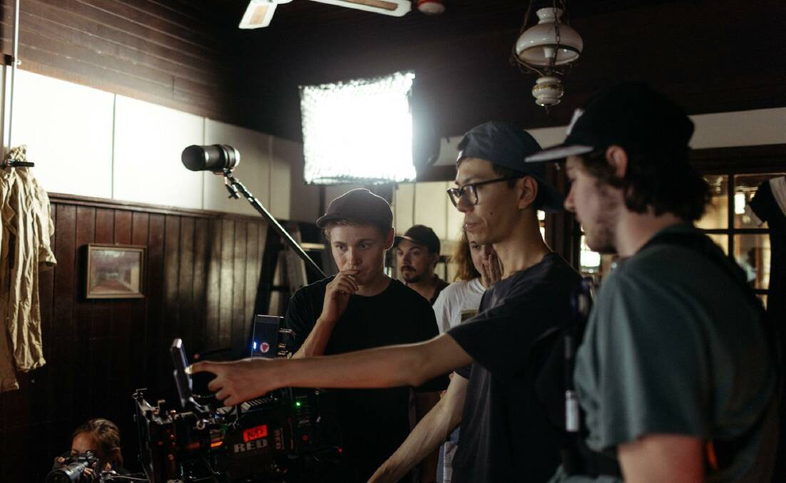 AND ACTION: Director Aron Attiwell (left) on set with his team at Fairbridge during filming. Photo: Supplied.