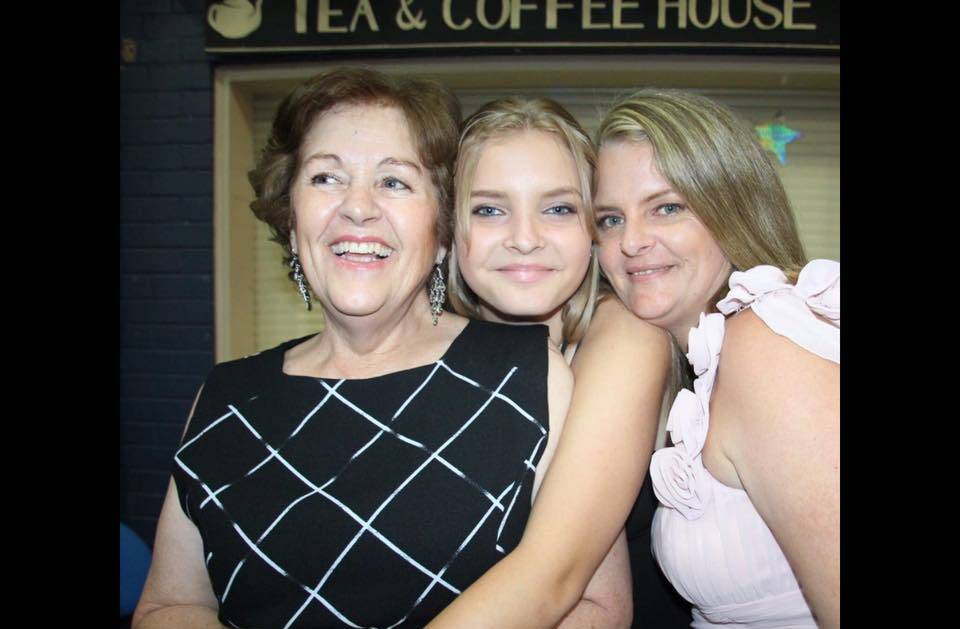 FAMILY: Polly, Brylin and Jodie smiling outside of the tea and coffee house at Pinjarra Civic Centre. Photo: Supplied. 