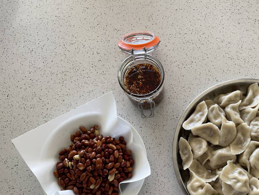 Simple but delicious: To accompany the pork and spring onion dumplings were roasted peanuts with a homemade, chilli sauce. Picture: Pip Waller 