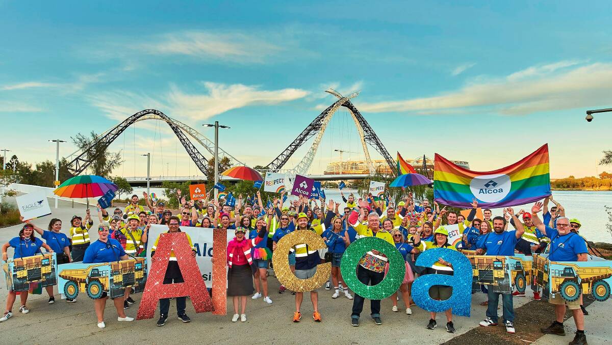 Celebration: Alcoa employees donned glitter and hard hats for Perth's 30th annual pride parade. Picture: Supplied.