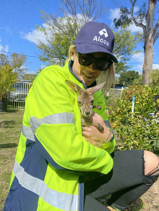 Alcoa employee Elise Mills volunteered with Mandurah Joey Marsupial Care. Picture is supplied.