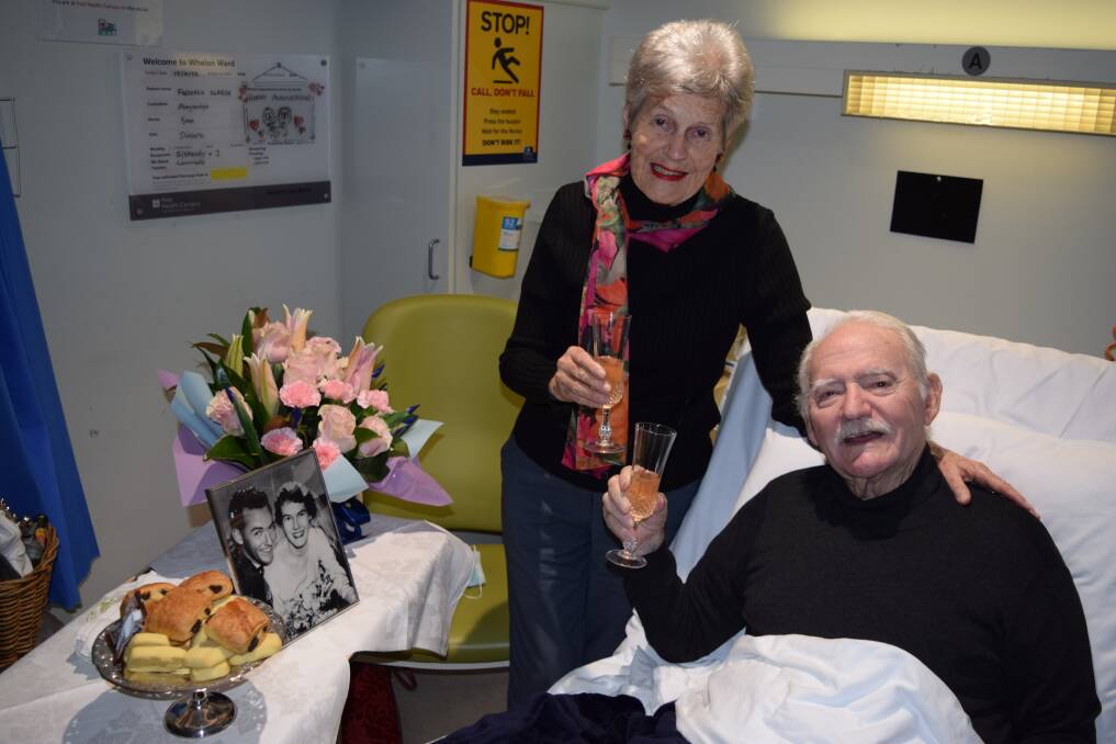 LIFE OF LOVE: Pauline and Fred celebrating their 65th wedding anniversary with a beautiful bedside toast. Picture: Perri Polson.