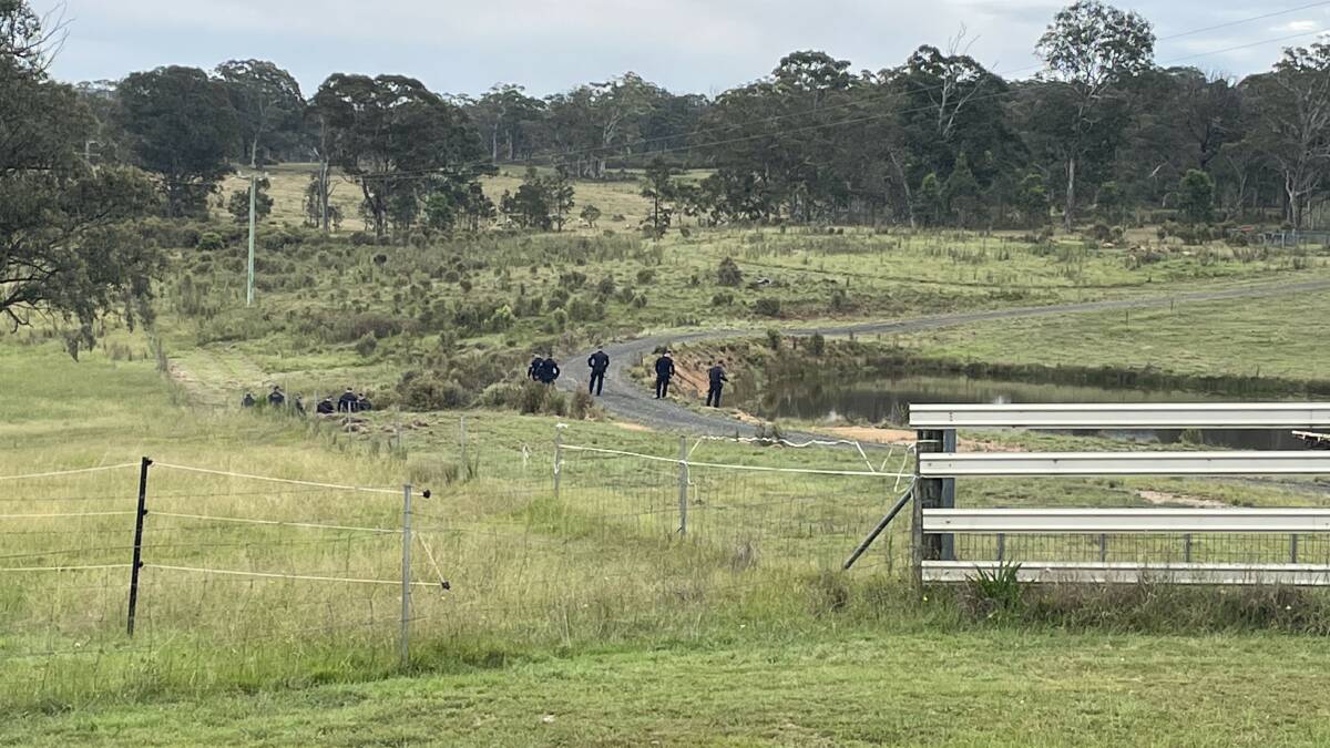Police attached to Strike Force Ashfordby are searching a potential crime scene at Hazelton Road, Bungonia. Picture by Burney Wong