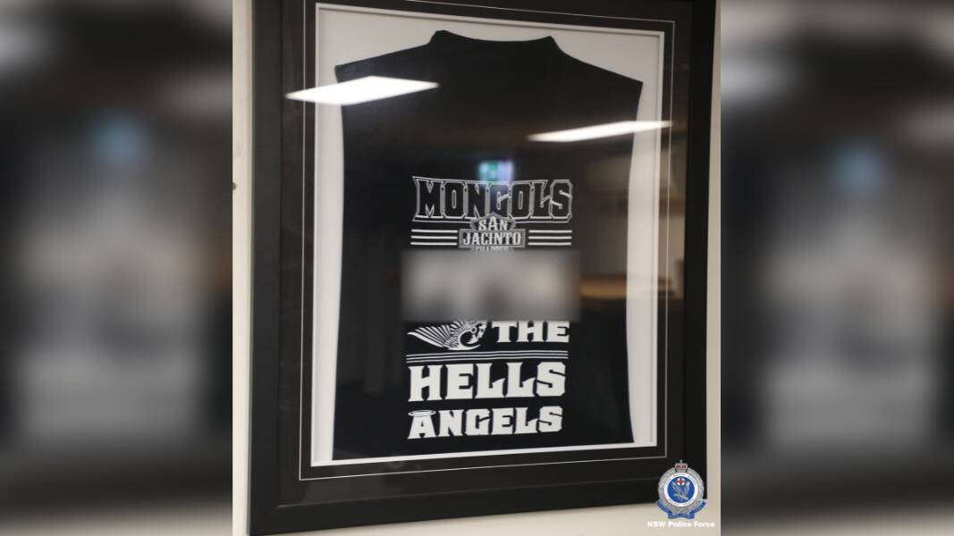 A framed Mongols top with an obscene phrase blurred. Picture via NSW Police