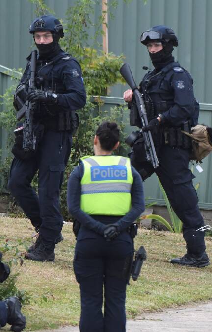 Heavily armed police from Melbourne were called to the siege.