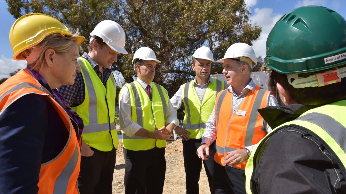Regional Development Minister Alannah MacTiernan, Murray-Wellington MP Robyn Clarke, Canning MP Andrew Hastie, Shire of Murray President Maree Reid and Water Minister Dave Kelly inspect the works on Transform Peel on Tuesday. Photo: Nathan Hondros.