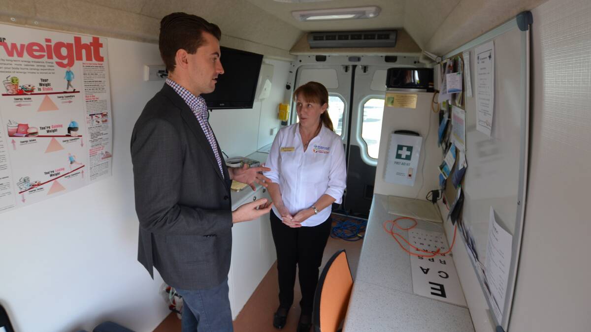 Dawesville MP Zak Kirkup and GP down south program coordinator Gail Frater inspect the Peel Mobile Health Service van. Photo: Nathan Hondros.