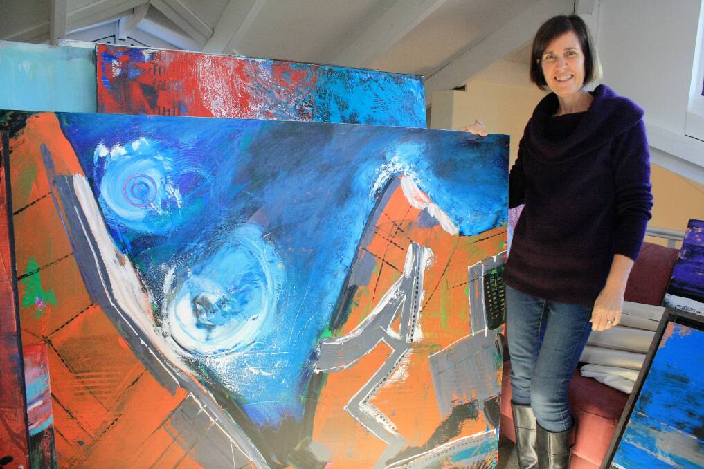 Life in colour: Local artist Hilly Coufreur with some of the art she made during a 12-month residency at Contemporary Art Spaces Mandurah (CASM). Photo: Supplied.