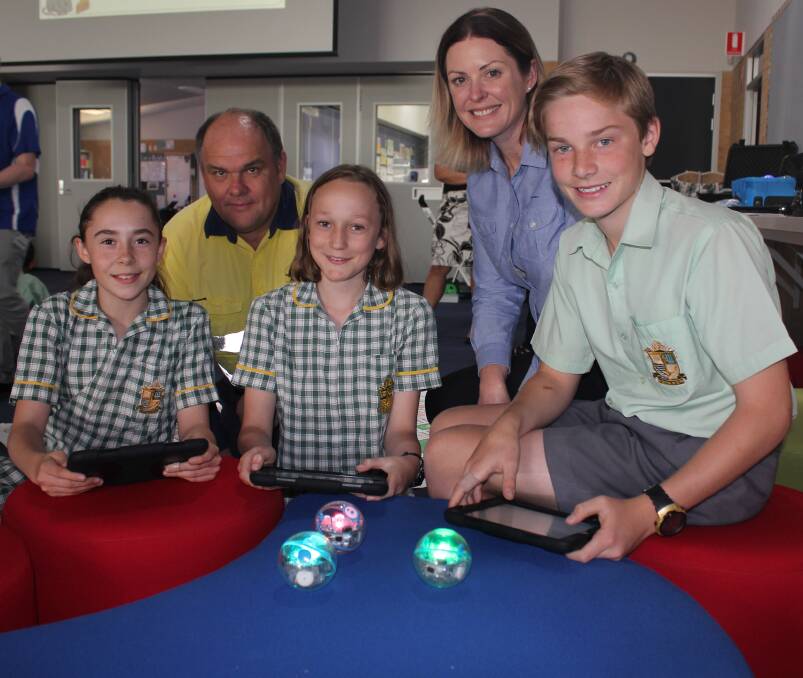 Bright futures: Matthew Cox and Gail Black with year 7 Frederick Irwin Anglican School students Kirsten Van Der Linde, Morghan Sattler and Luke Storey. Photo: Supplied.
