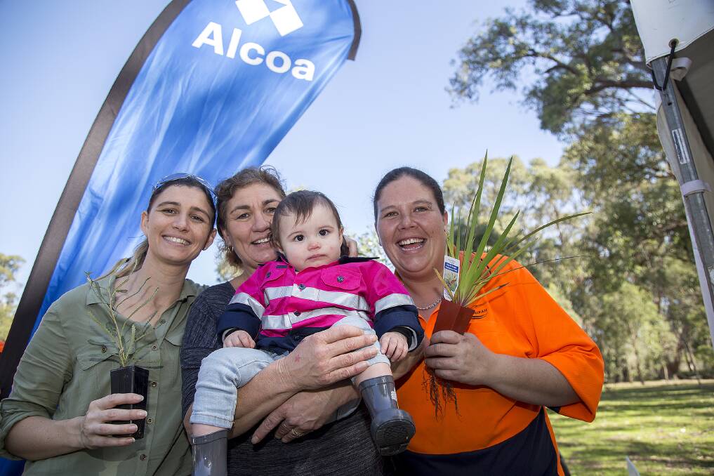 Applications open: Tegan Matheson, Jane Santamato, Willow Thomson and Jessica Thomson at the Alcoa supported City of Mandurah National Tree Day 2017. Photo: Supplied.