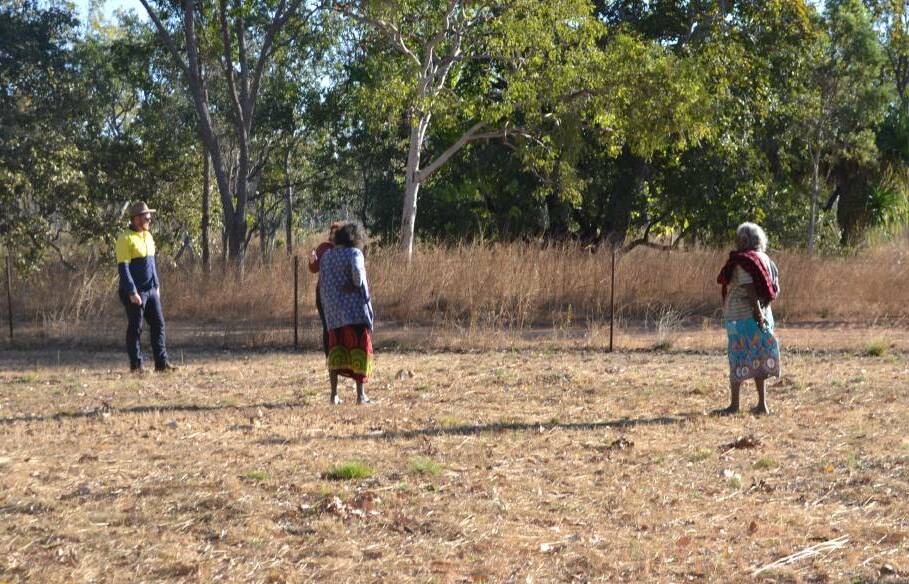  Traditional owners identifying unmarked graves in Barunga last year. Picture: supplied.