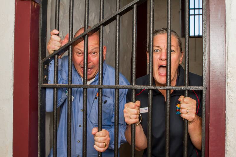 Behind bars: Ocean Road principal Dean Finlay and Tracy Goscombe from the Cossack heritage town site. Photo: Nicky Grobler