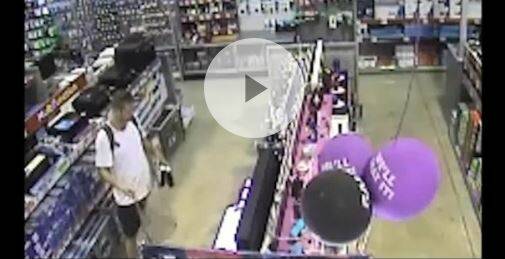 A still from footage WA Police released of the man inside one of the electrical stores.