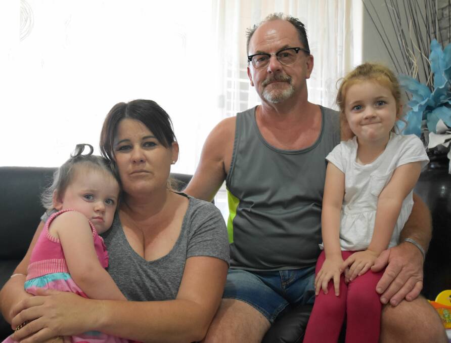 Lucky to be alive: Mandii Tennick with her husband Gari and two grandchildren, Isabella Daniels (left) and Maddysan Daniels (right), who were happy Mandii had returned home after the ordeal. Photo: Carla Hildebrandt. 